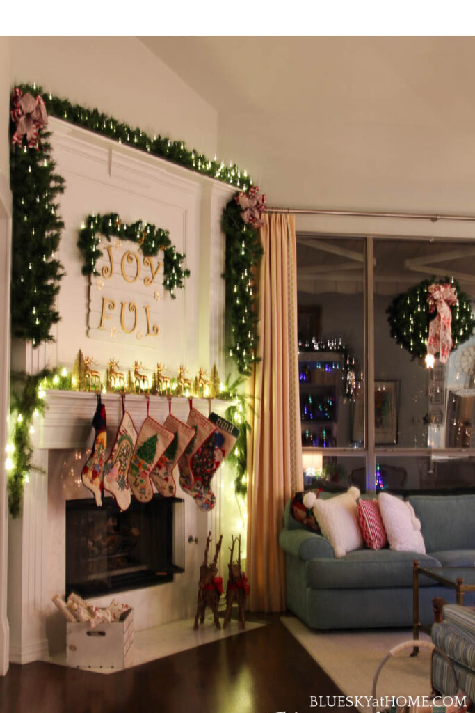fireplace decorated with garland