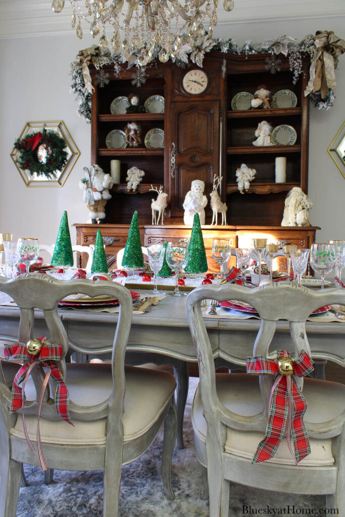 red plaid bow tied on back of chair