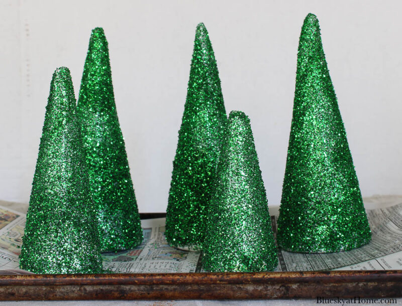 green glitter Christmas trees on tray