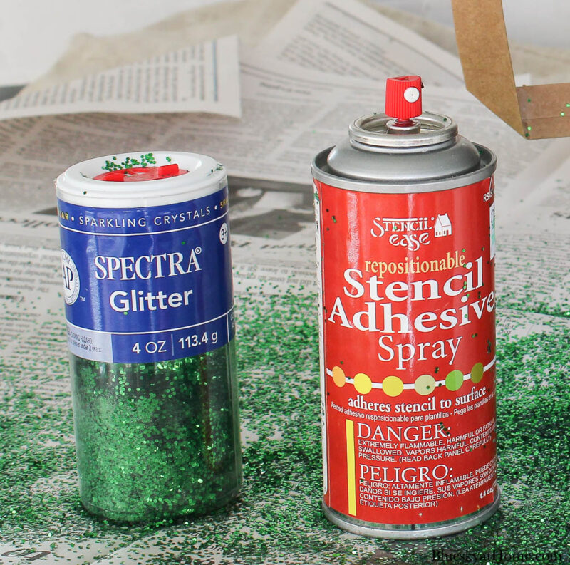 green glitter and spray adhesive