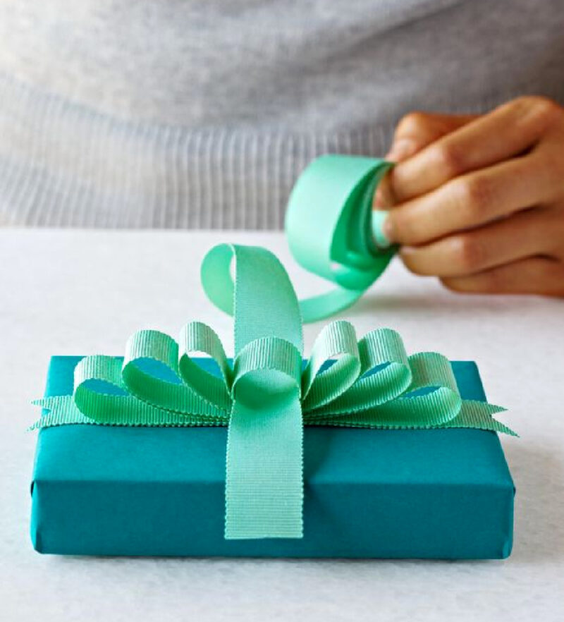 green bow on blue package