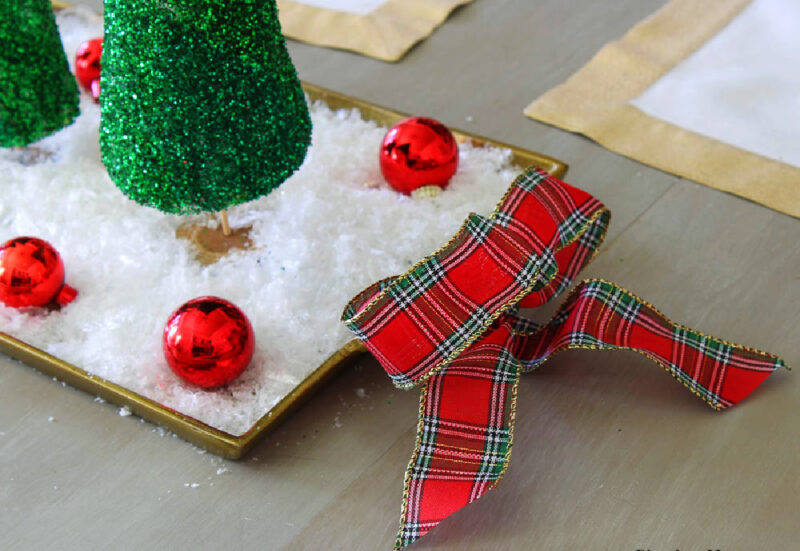 plaid bows on brass tray