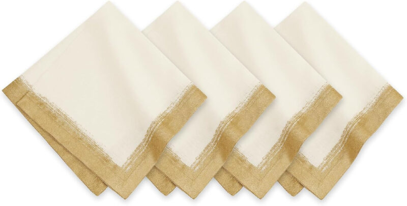 white linen with gold trim napkins