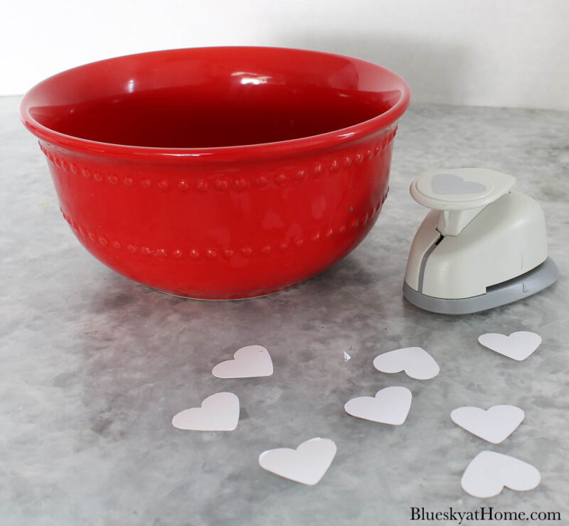 red bowl with white vinyl hearts