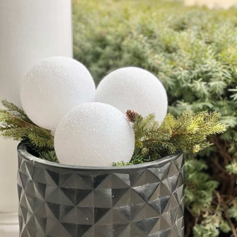 faux snowballs in decorative galvanized bucket