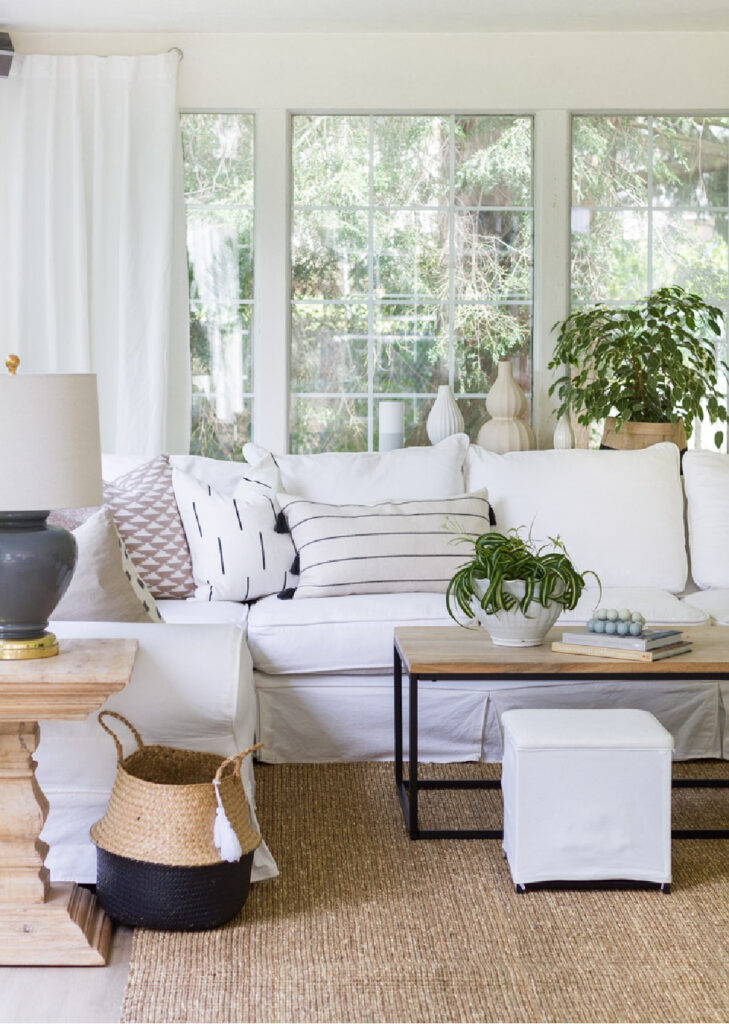 white sofa in living room with wood and metal table