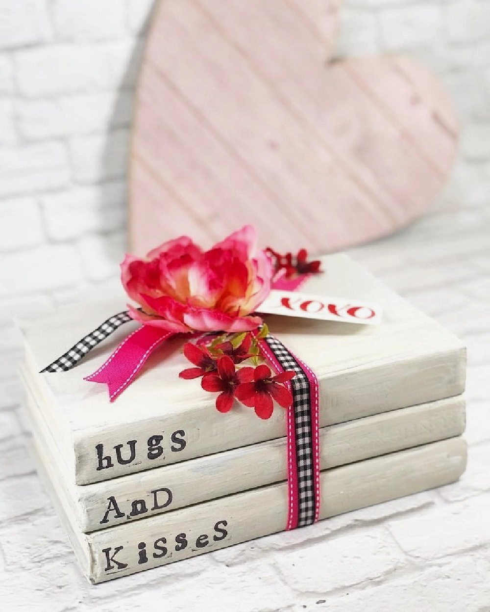 stack of books with Valentine words