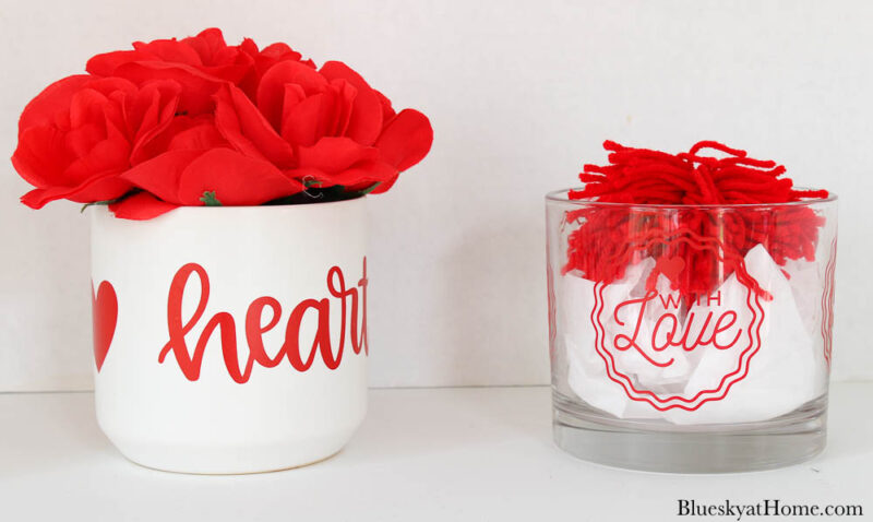 vases with red roses and red pom~pom