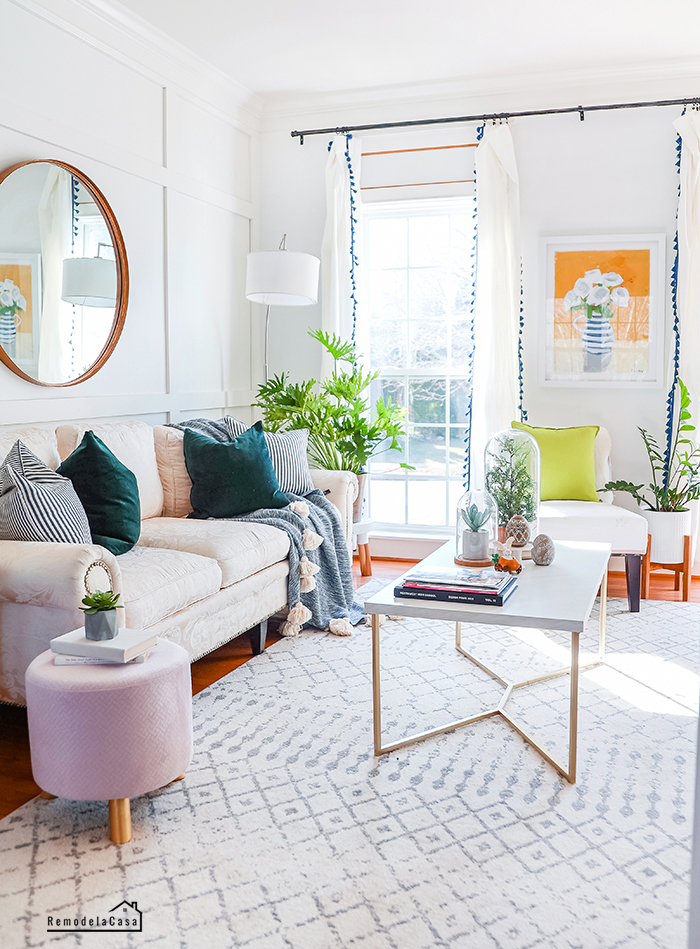 white living room with pops of bright colors