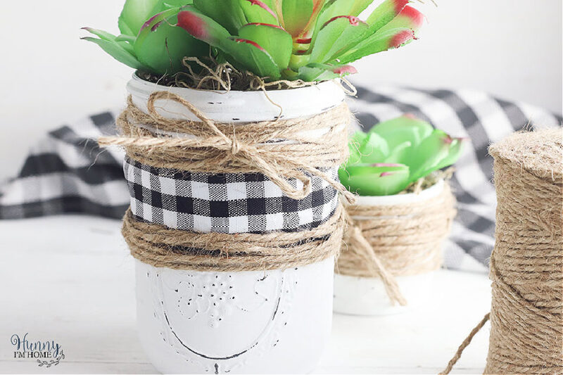 mason jar decorated with check ribbon and twine