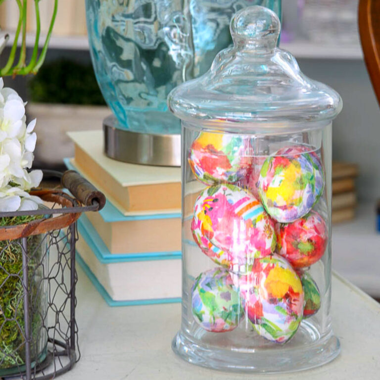 decoupage Easter eggs in an apothecary jar.