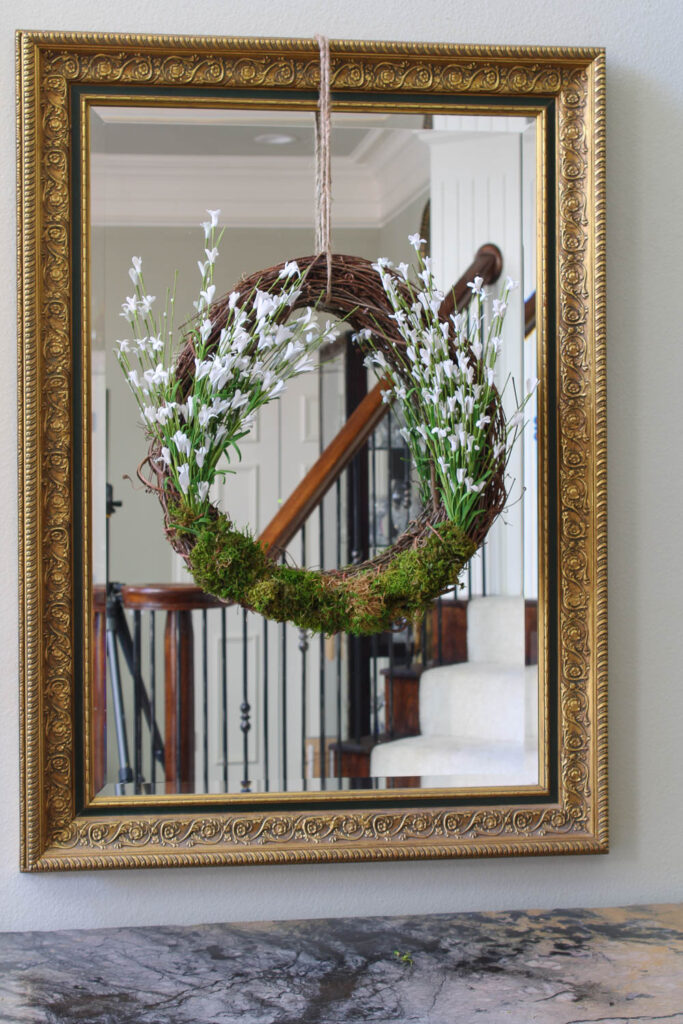 spring wreath on mirror