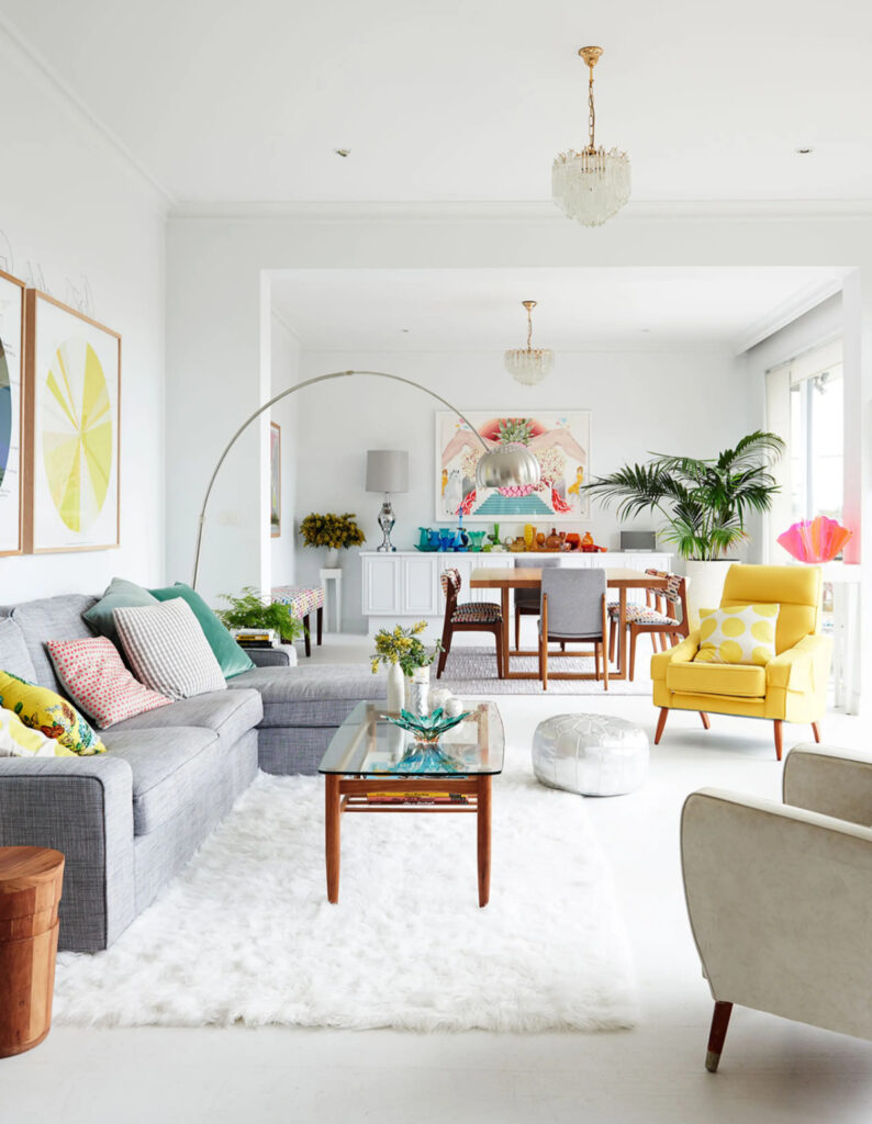 Mid-Century white living room with bright pops of color