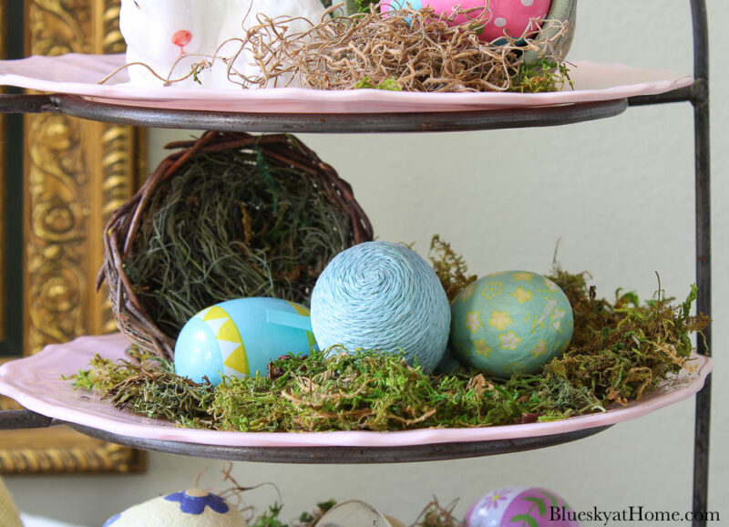 nest with moss and Easter eggs
