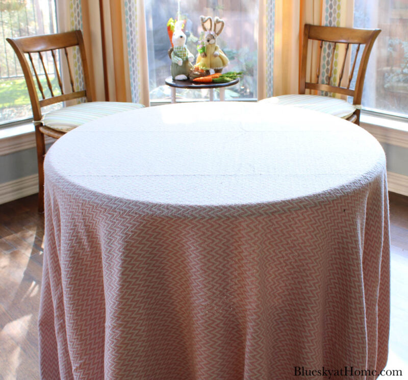 pink throw on table