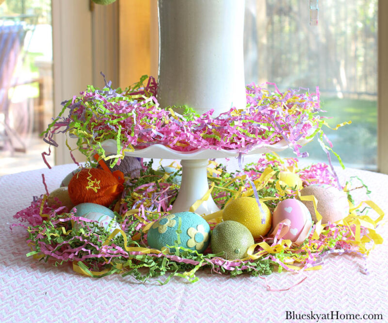 Easter eggs under cake stand