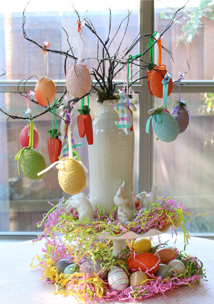 easter bunny tree with colored eggs, carrots, and wood bunnies