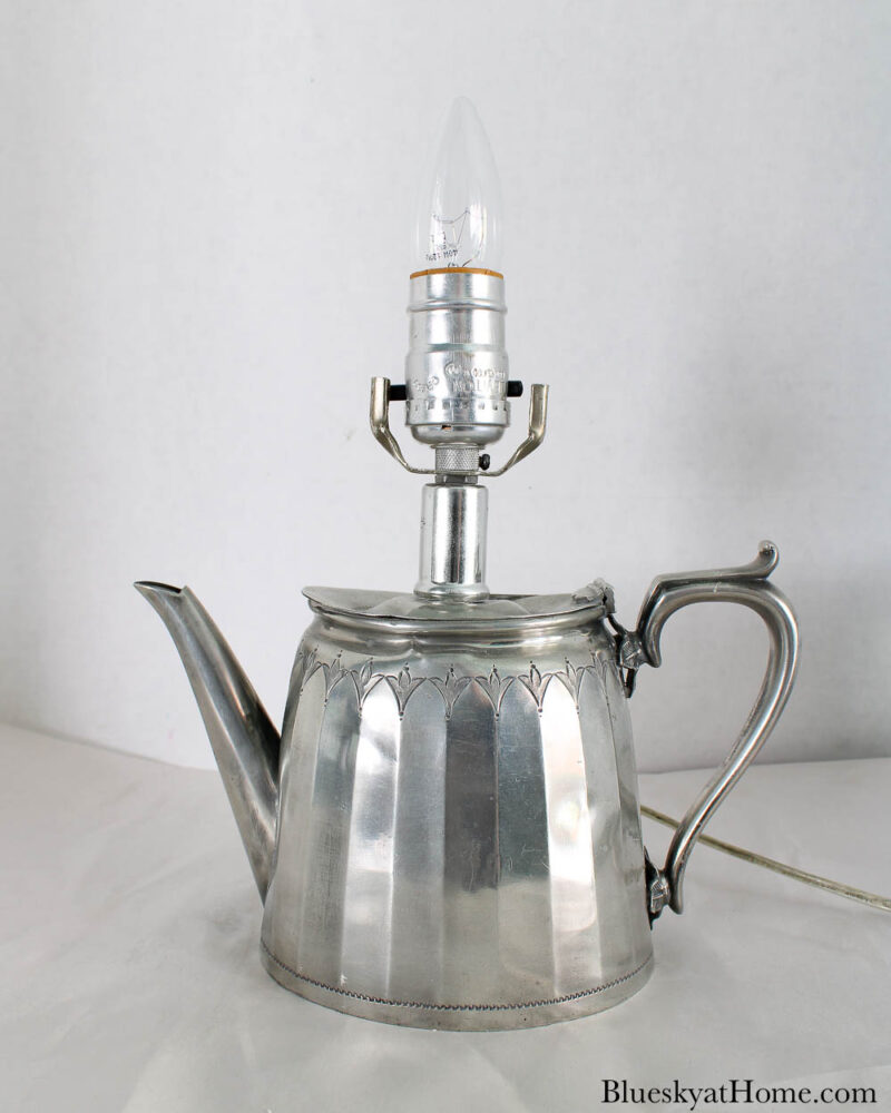 silver lamp from pitcher