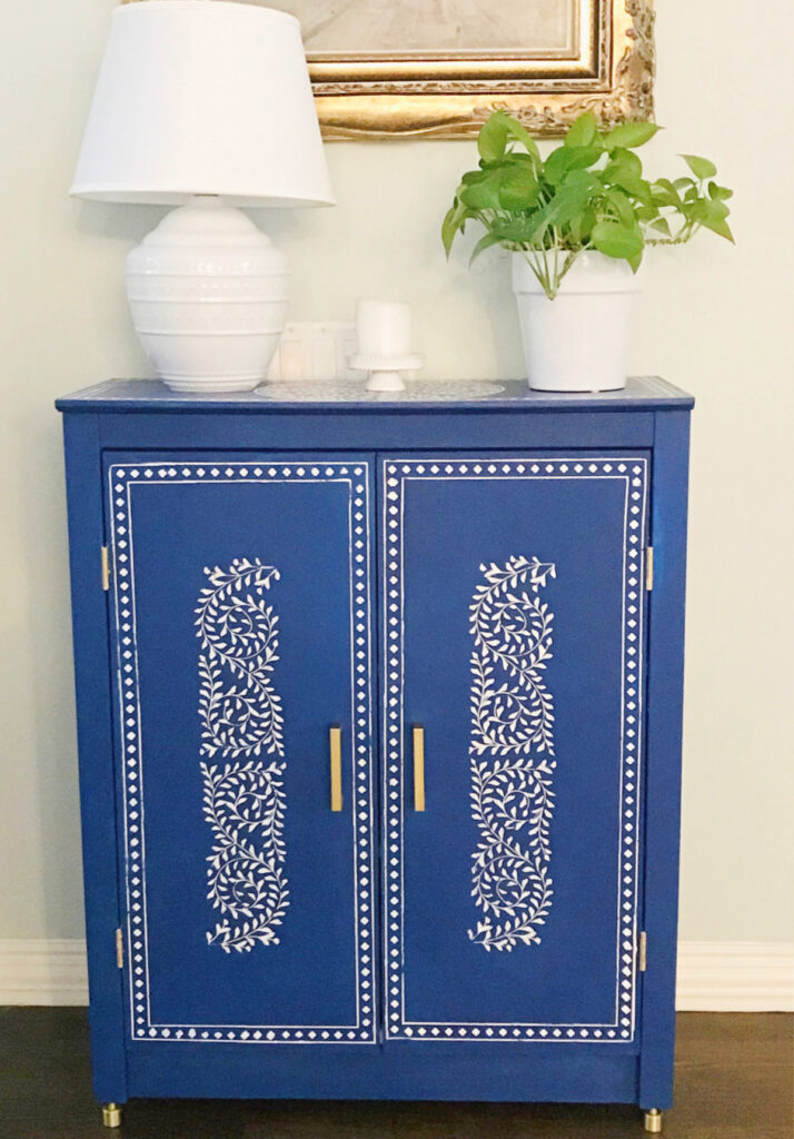 blue painted stenciled cabinet