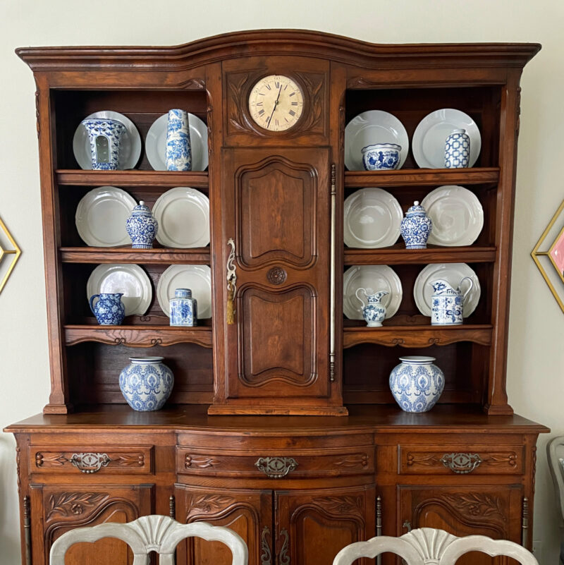 blue chinoiserie on a hutch in the dining room