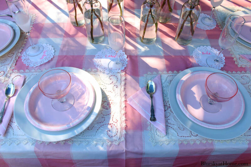 pink summer place setting with pink dishes