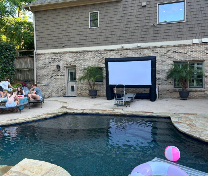 outdoor movie screen at pool party