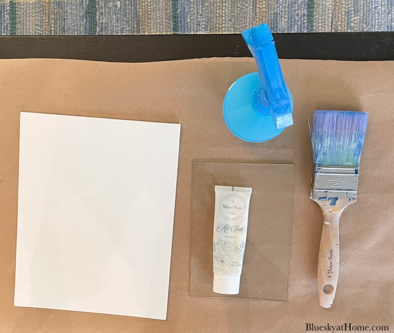 canvas, paint and brush for making mixed media