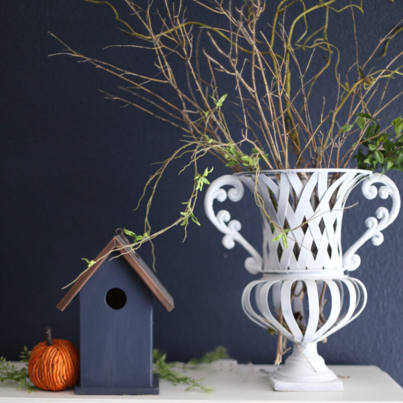 fall design with white urn and twigs