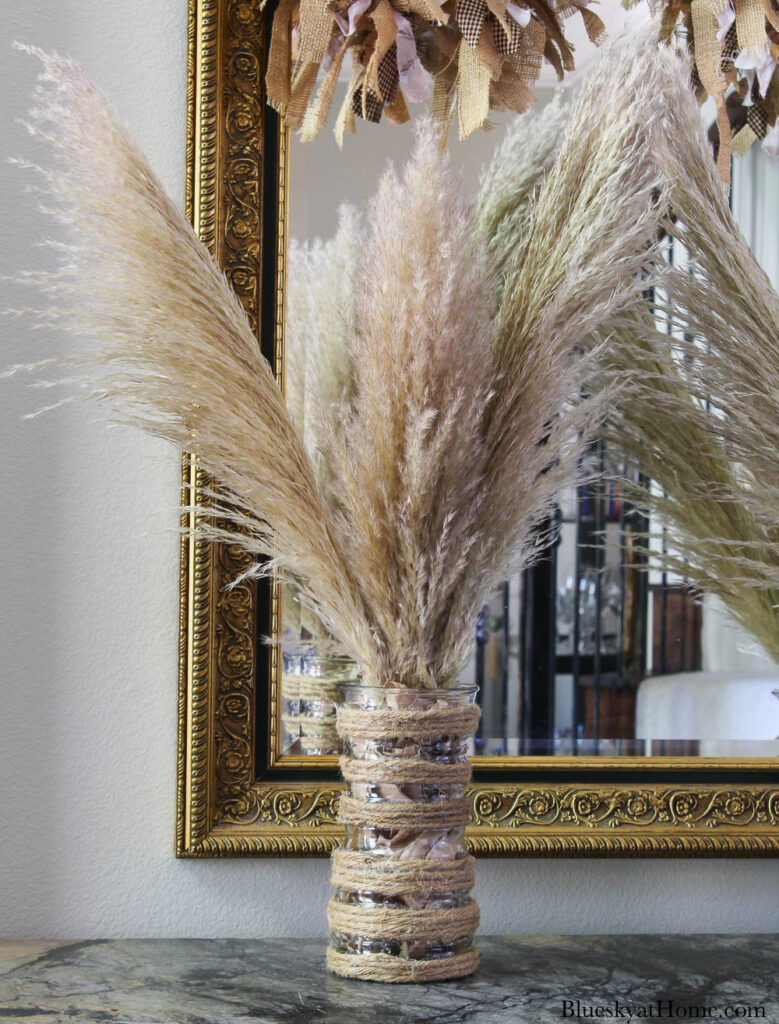 decorated glass vase with jute