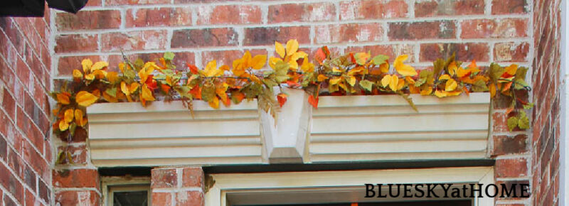 faux garland above front door