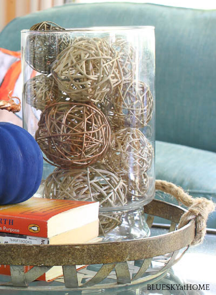 twig balls in glass vase