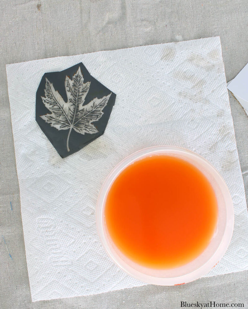 leaf stencil and bowl of water