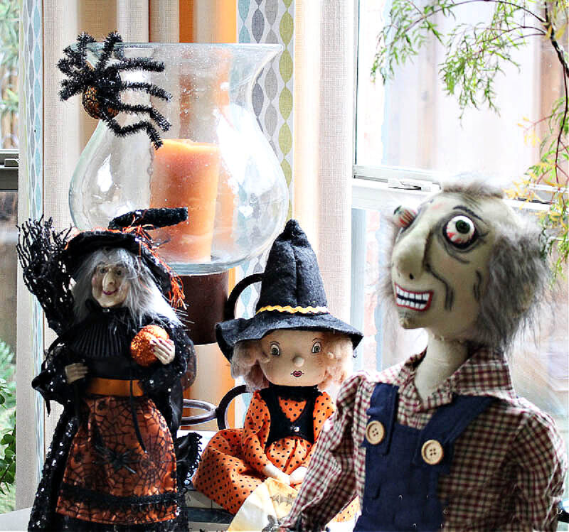 Halloween decor with witches and ghoul