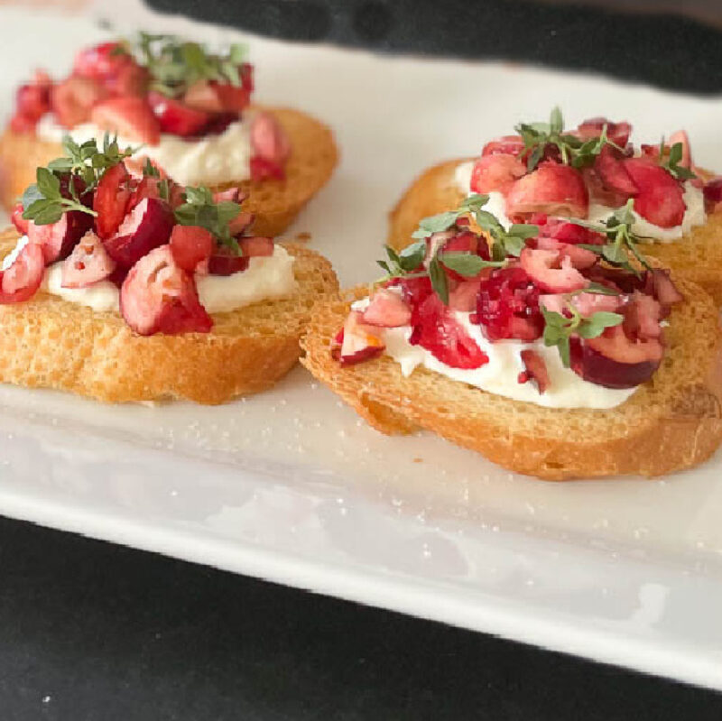 cranberry ricotta crostini on platter