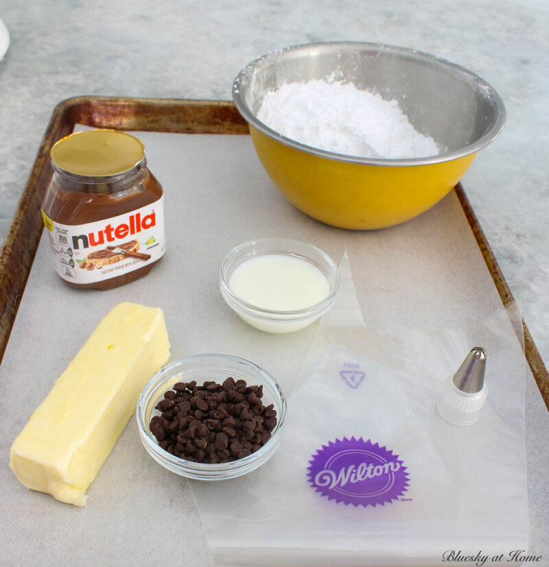 ingredients for Nutella frosting on tray.