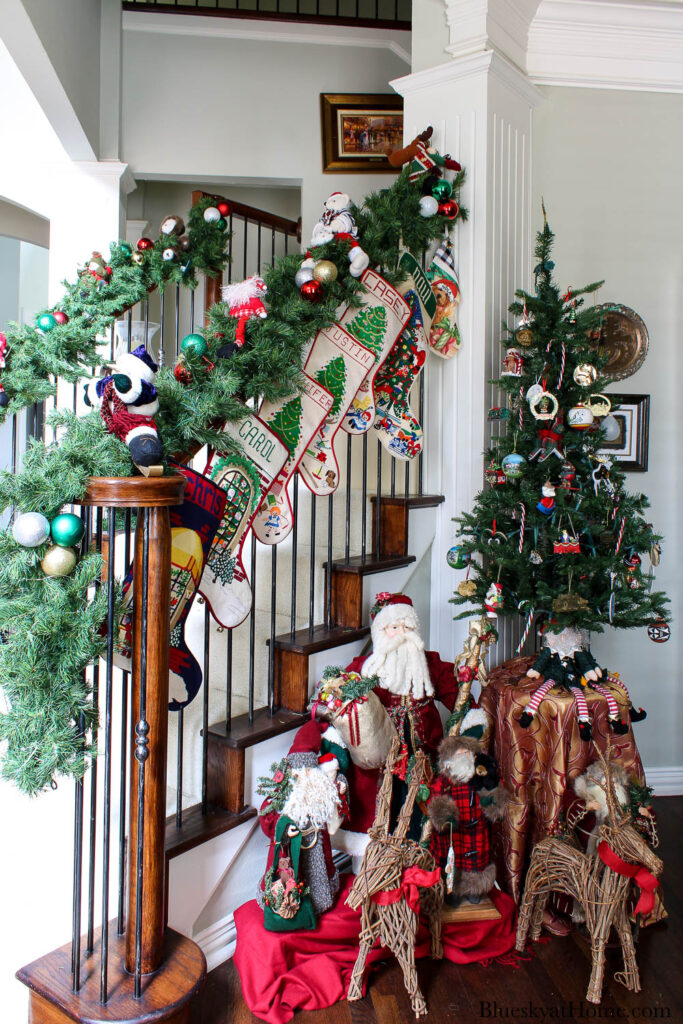 staircase with Christmas tree and santas