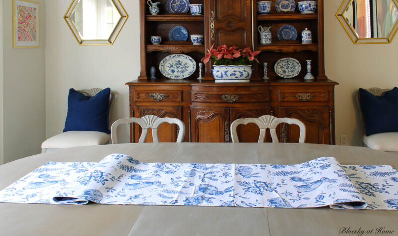 blue and white runner on dining table