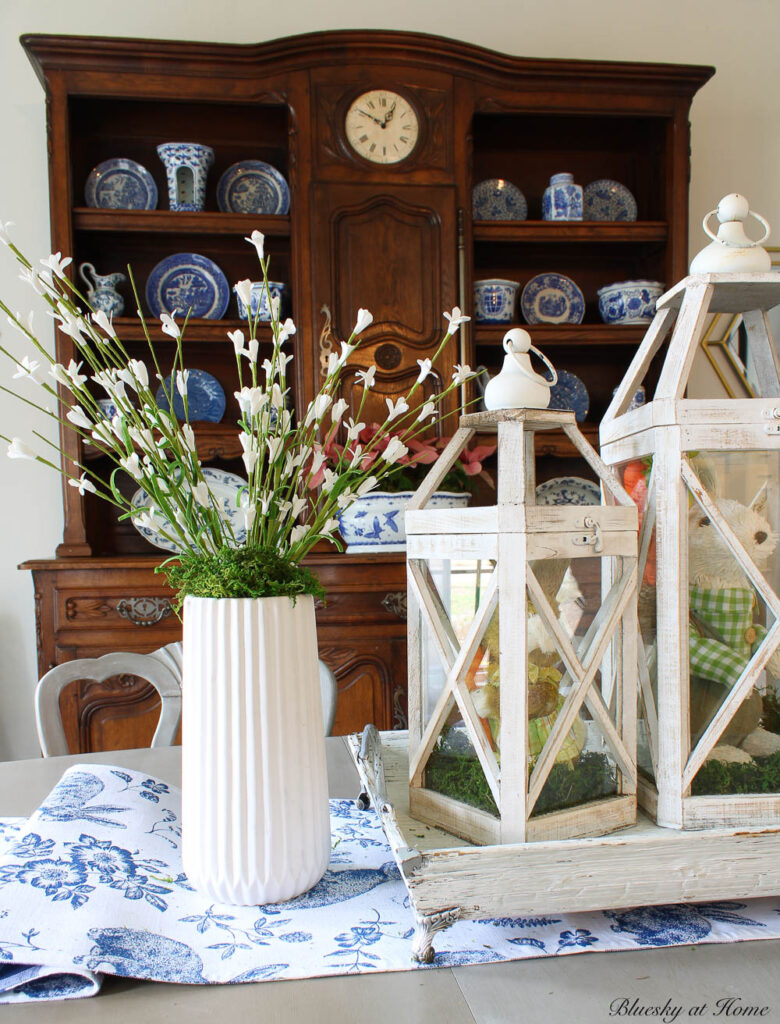 white vase with white flowers