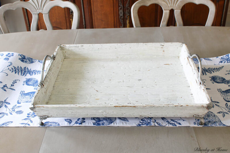 white tray on blue and white runner