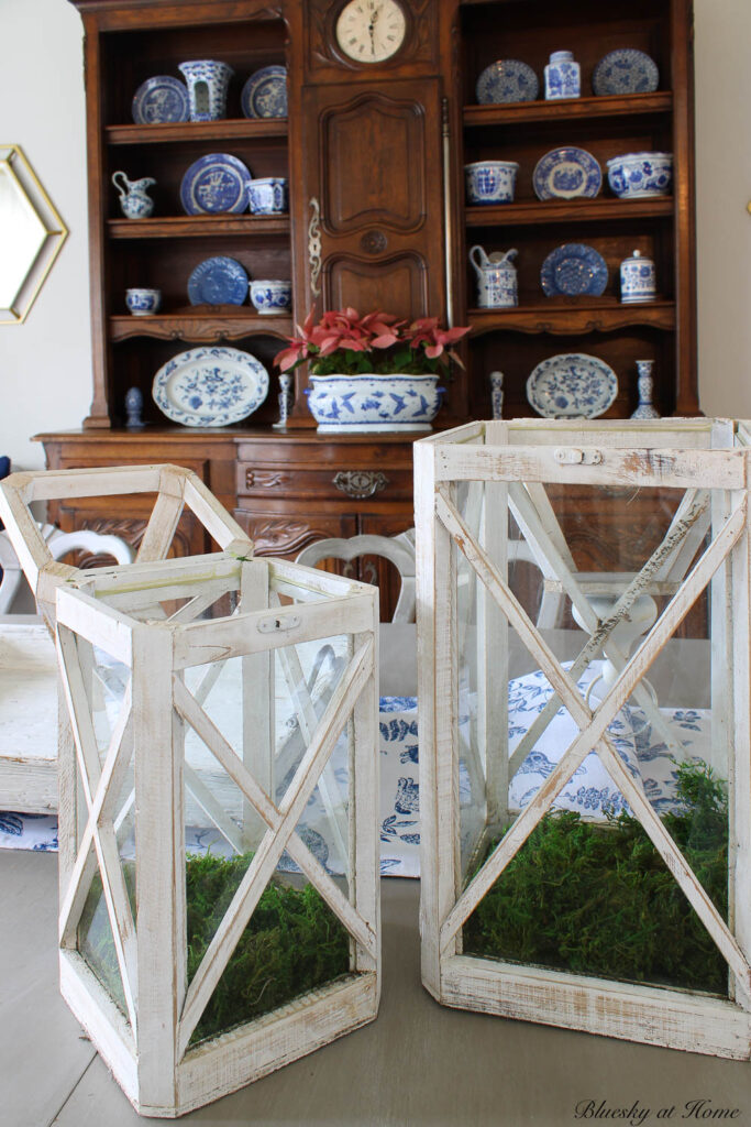 white lanterns with green grass