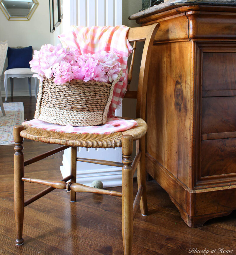 pink flowers in woven basket