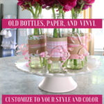 decorated glass bottles with pink paper and vinyl and ribbon