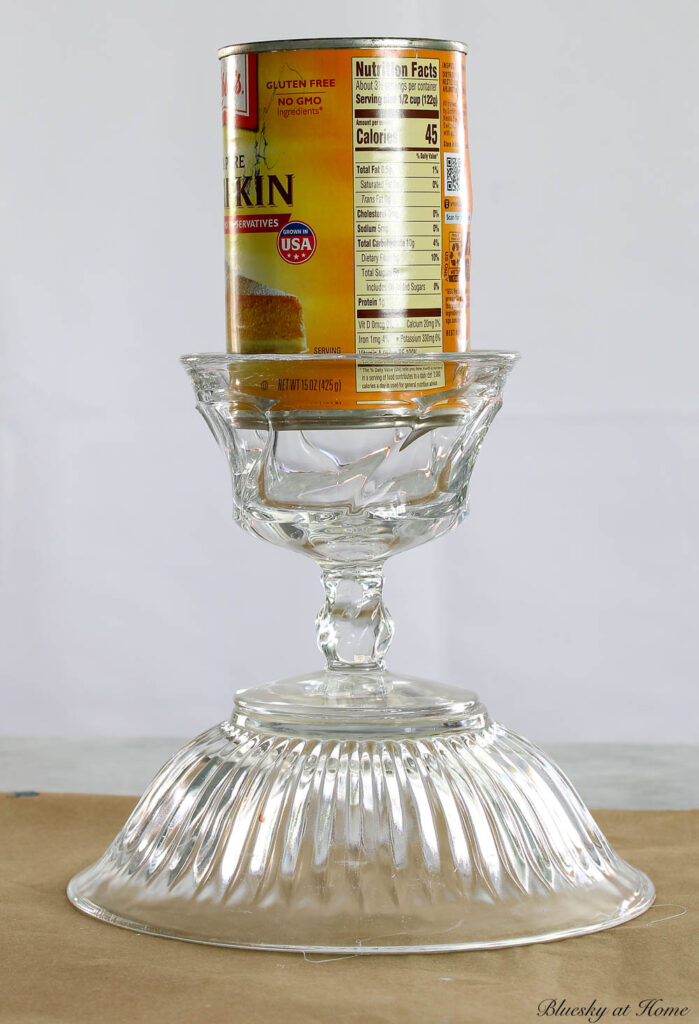 glass dish weighted with can