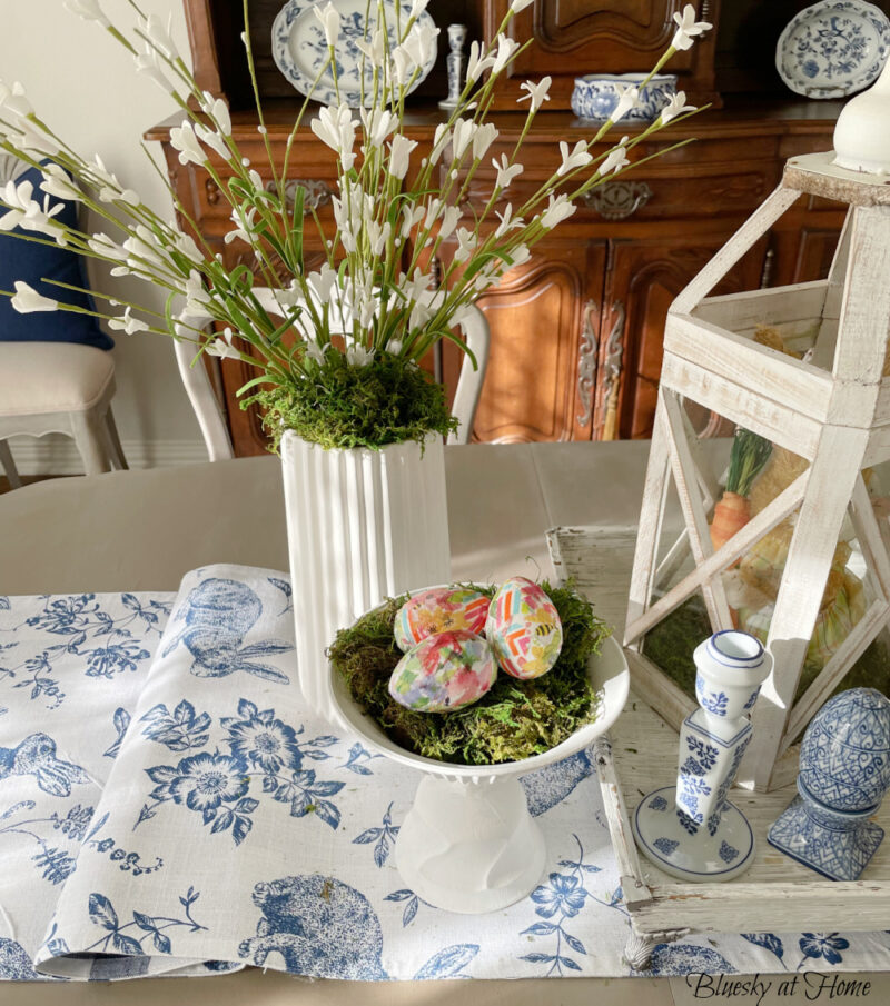 floral eggs in a white glass painted dish