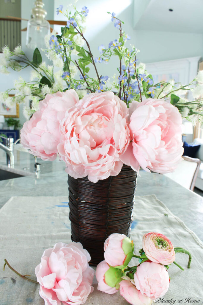 peonies in the spring flower basket