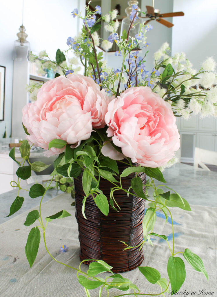 peonies in the spring flower basket