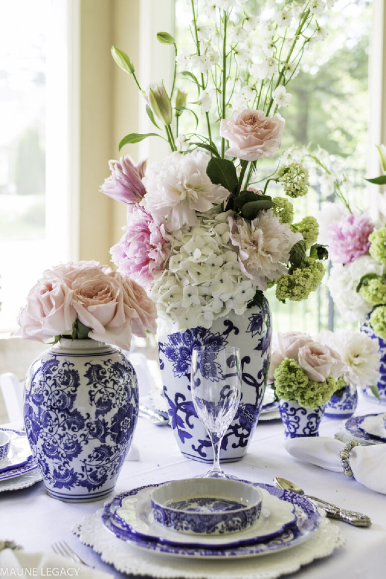 summer tablescape in blue and white and pink flowers