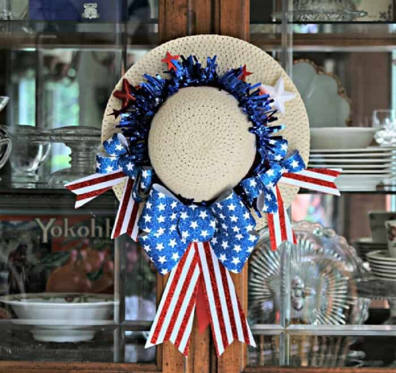 patriotic red, white, and blue hat wreath on hutch