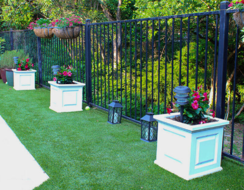 white planters with flowers