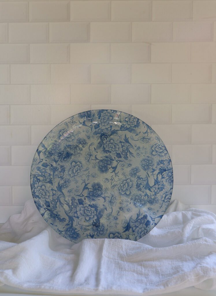 blue decoupage glass platter on blue napkin